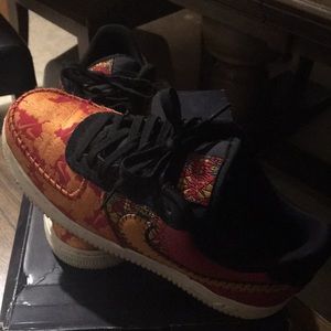 Multi color low top Air Force ones. Very unique and different. It takes swag